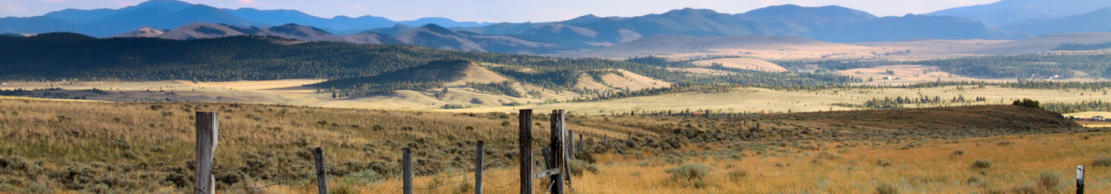 Landscape of fields and mountains